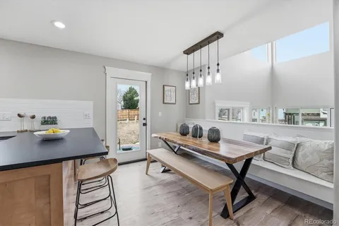 a view of a workspace with furniture