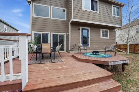 an aerial view of residential house with an outdoor space