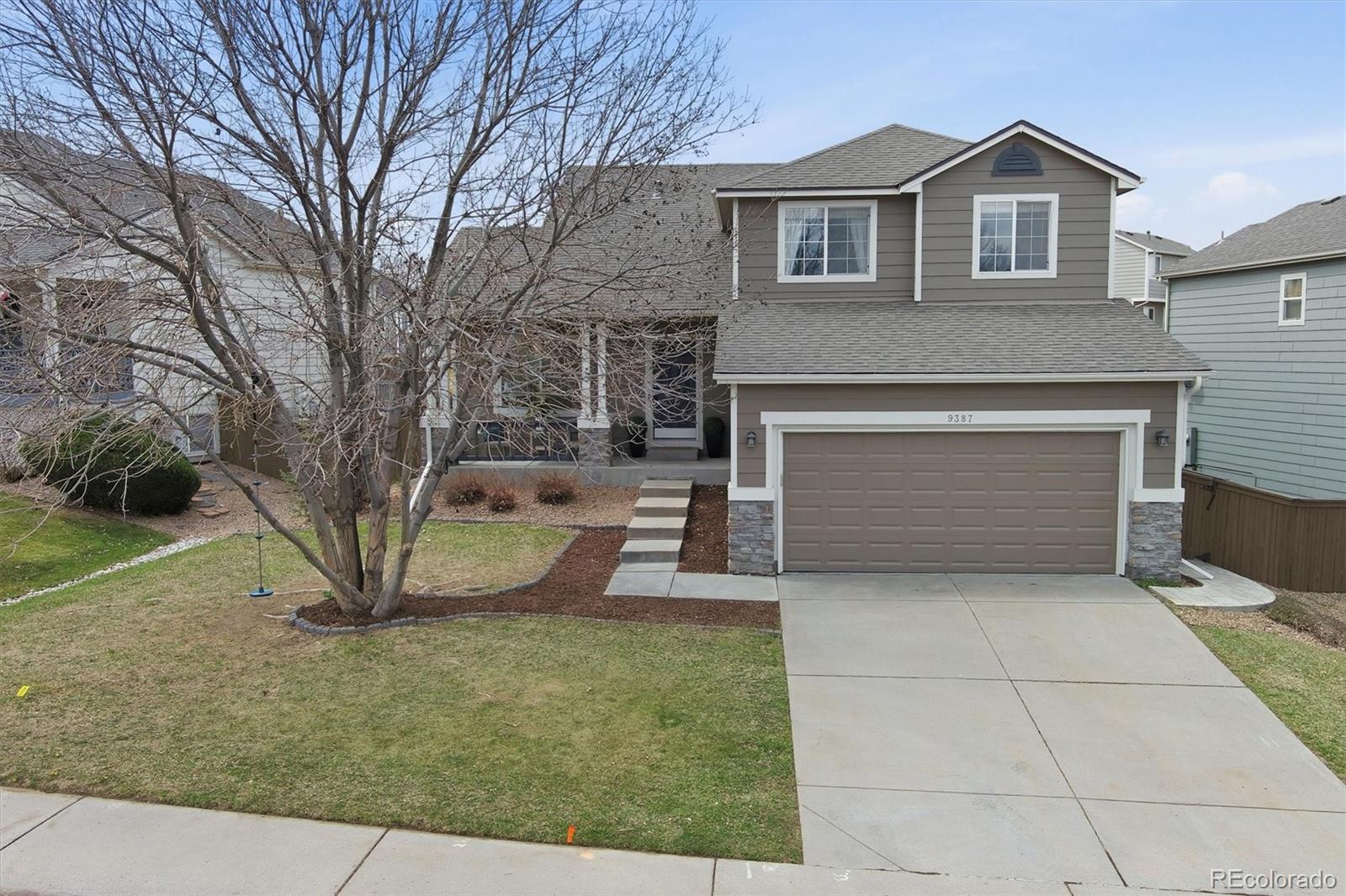 9387 Wolfe Drive Highlands Ranch, CO 80129 - Photo 50 of 50 a house view with a outdoor space