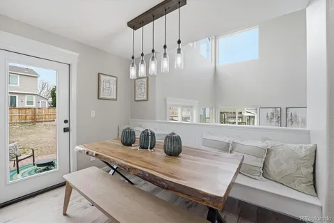 a living room with furniture and a table