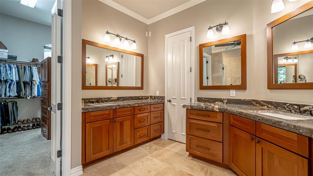 400 Porter Road Bartonville, TX 76226 - Photo 16 of 40 a kitchen with stainless steel appliances granite countertop a stove a sink and a refrigerator