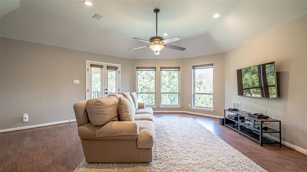 400 Porter Road Bartonville, TX 76226 - Photo 21 of 40 a living room with furniture and a chandelier
