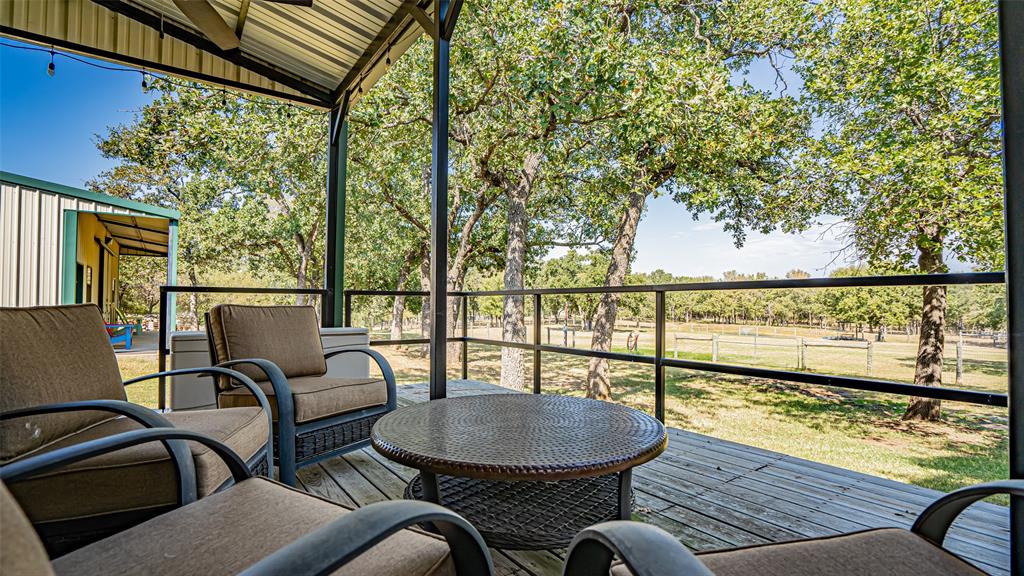 400 Porter Road Bartonville, TX 76226 - Photo 36 of 40 a view of a chairs and table in the balcony