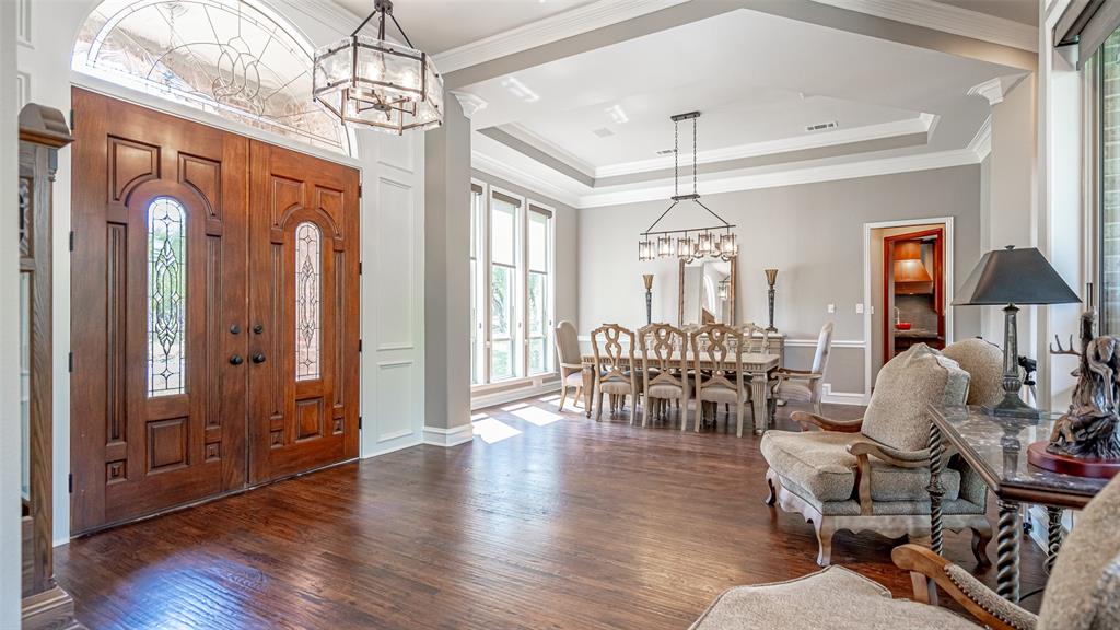 400 Porter Road Bartonville, TX 76226 - Photo 4 of 40 a living room with furniture and a chandelier
