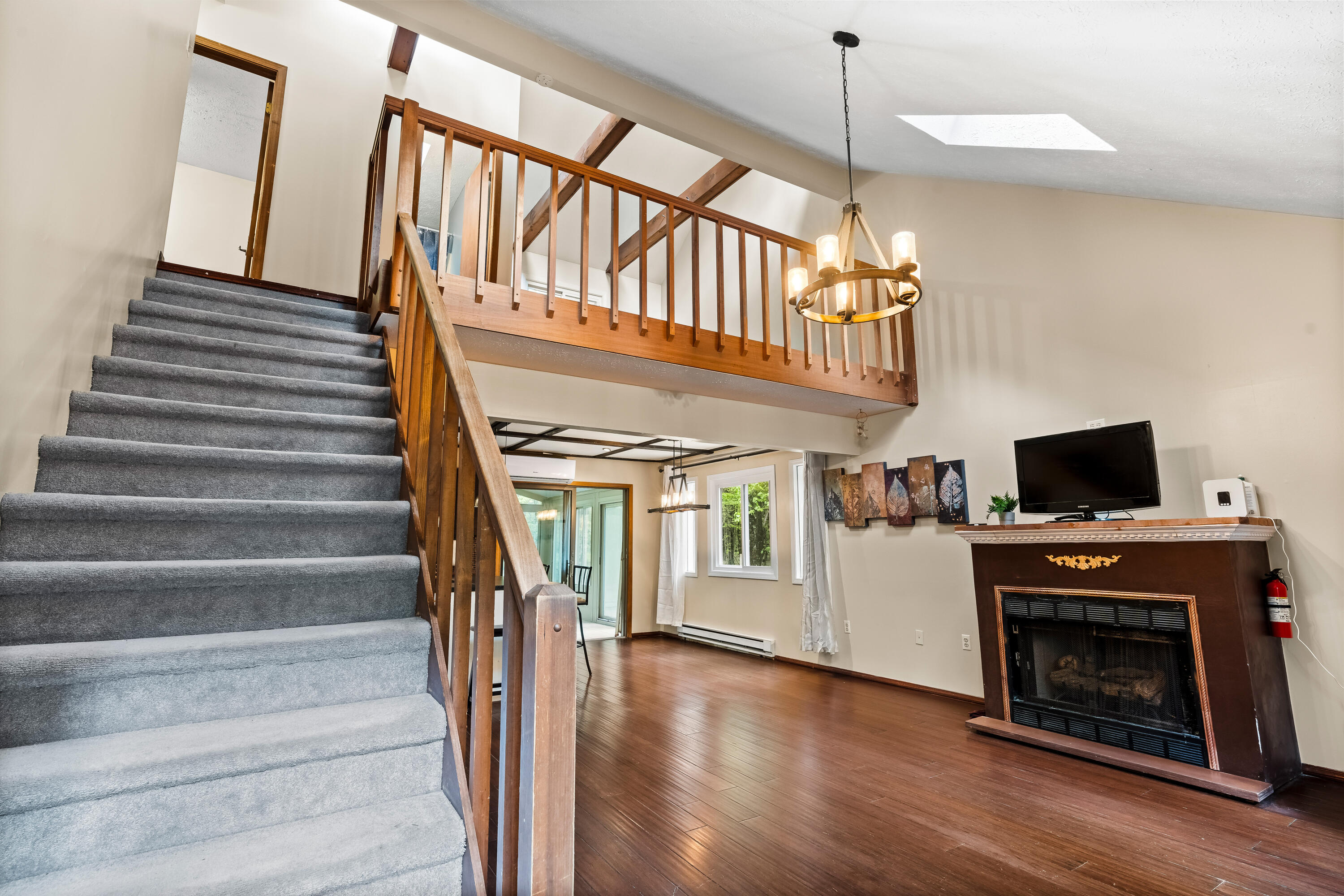 205 Victory Lane Long Pond, PA 18334 - Photo 14 of 51 a view of entryway livingroom and hall with wooden floor