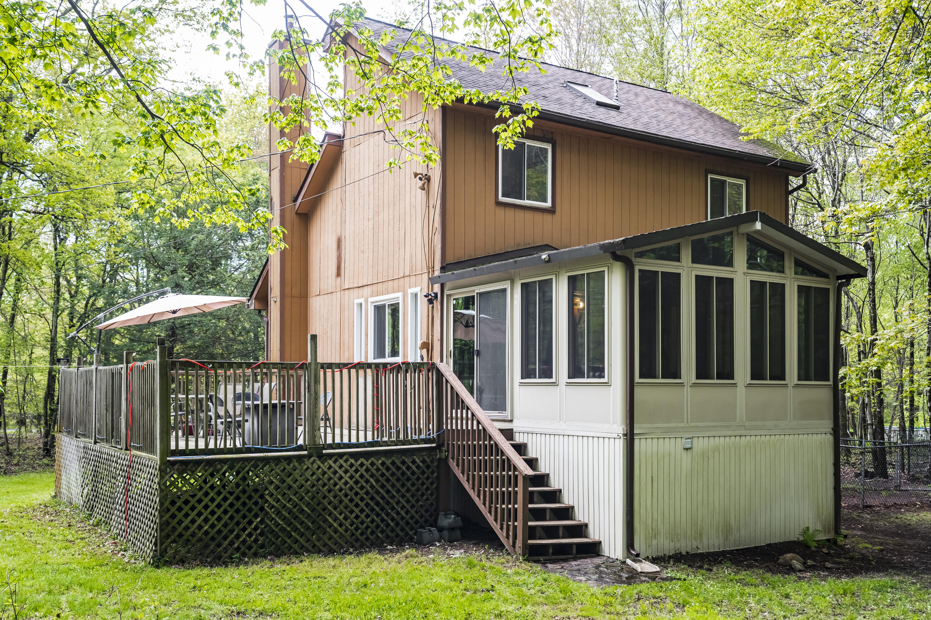 205 Victory Lane Long Pond, PA 18334 - Photo 43 of 51 a view of a house with backyard and deck
