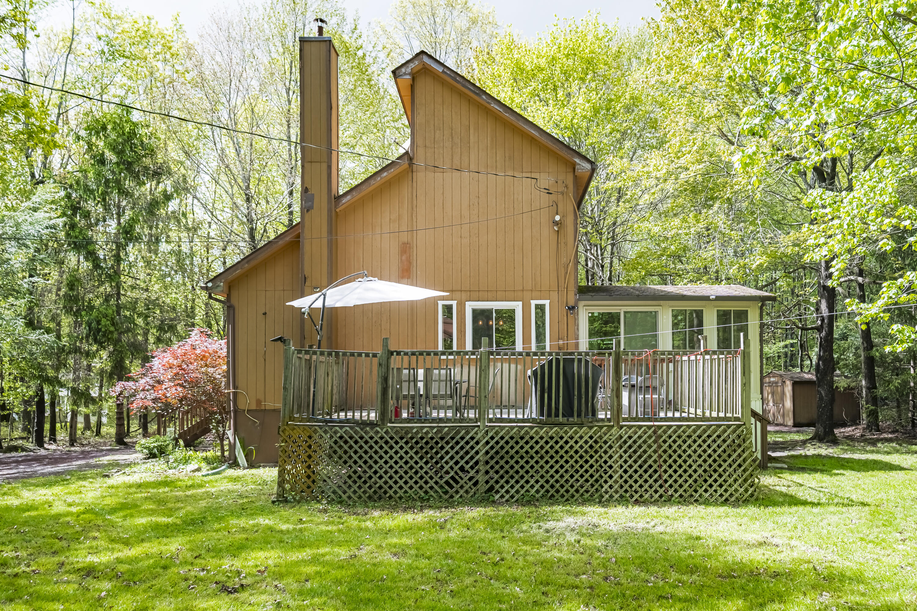 205 Victory Lane Long Pond, PA 18334 - Photo 45 of 51 a front view of a house with a garden