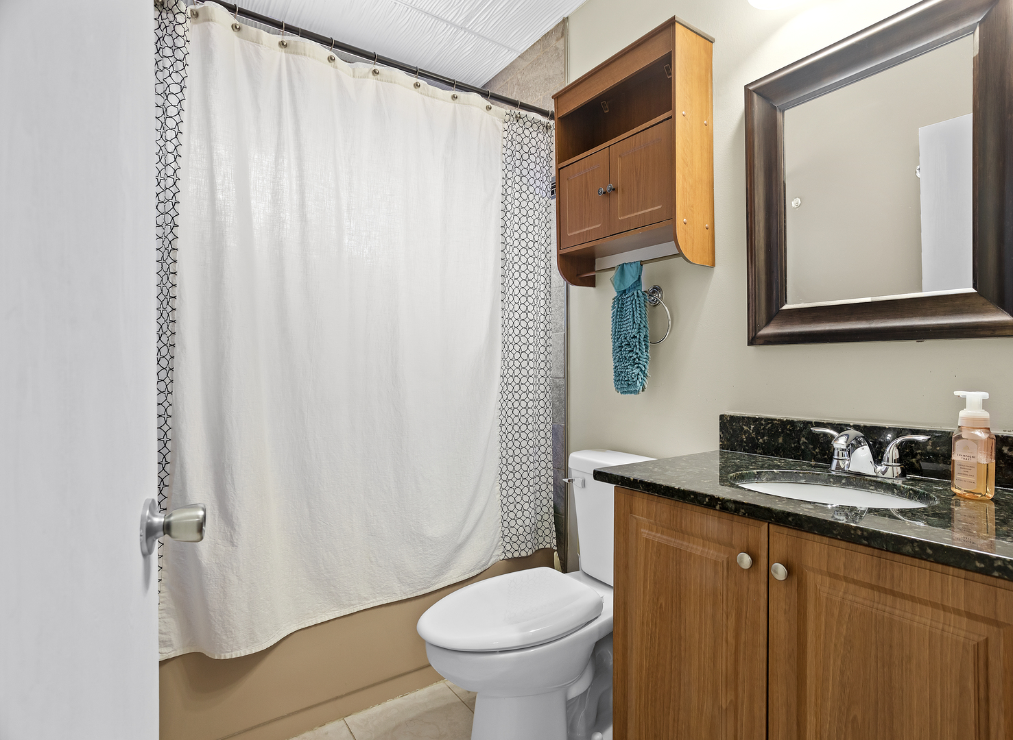 206 Seabury Road Bolingbrook, IL 60440 - Photo 14 of 16 a bathroom with a granite countertop toilet sink and mirror