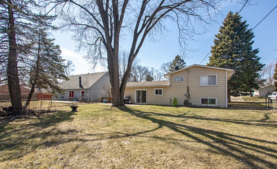 206 Seabury Road Bolingbrook, IL 60440 - Photo 3 of 16 a view of a house with a yard covered in snow
