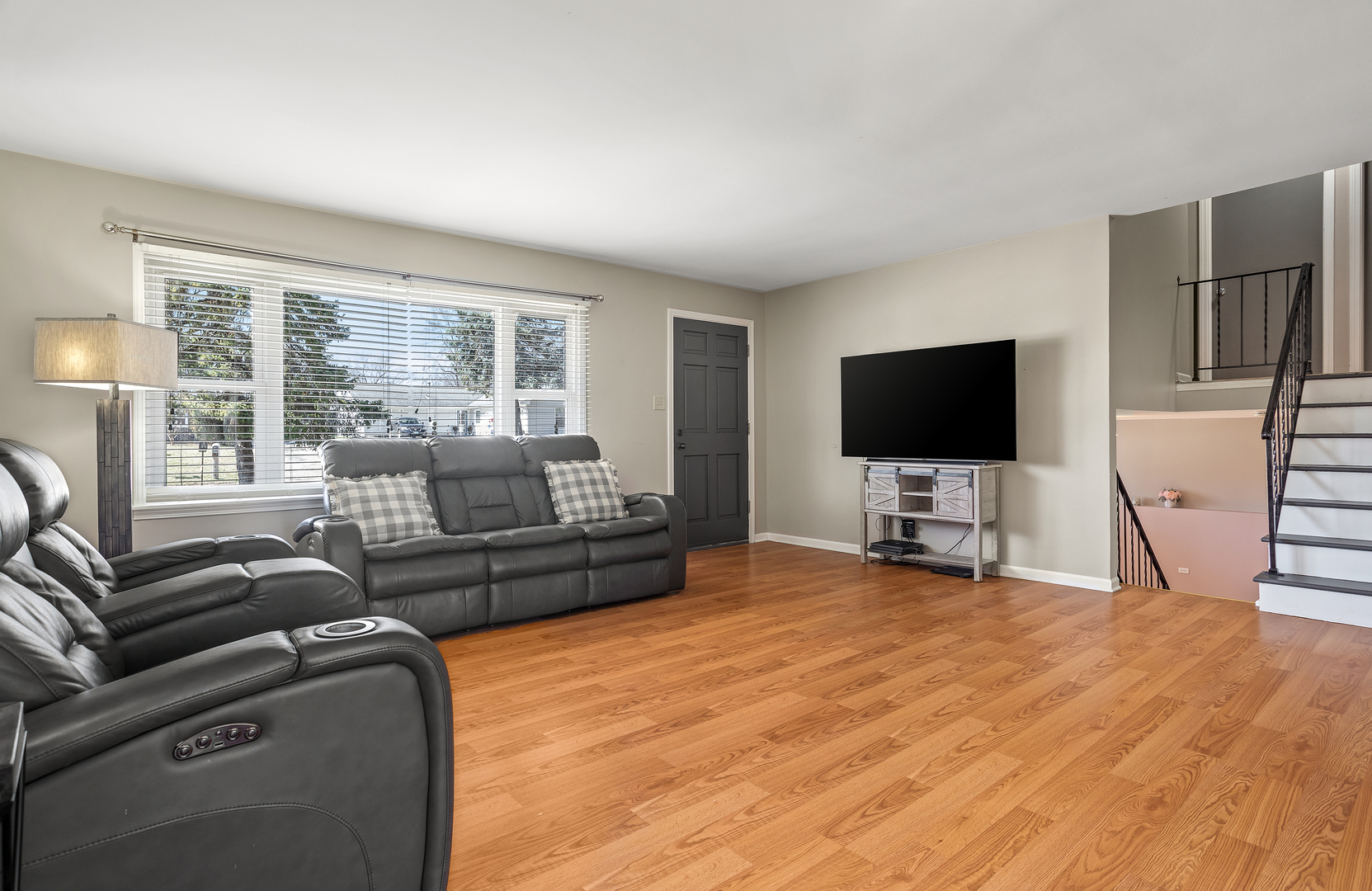 206 Seabury Road Bolingbrook, IL 60440 - Photo 5 of 16 a living room with furniture and a flat screen tv