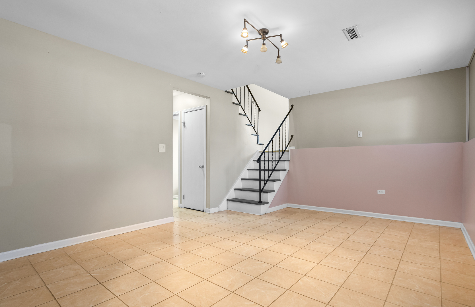 206 Seabury Road Bolingbrook, IL 60440 - Photo 8 of 16 a view of an empty room with stairs