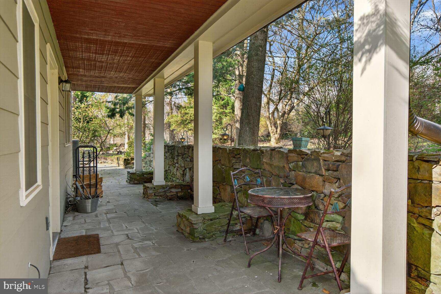 17641 Raven Rocks Road Bluemont, VA 20135 - Photo 57 of 109 Side Porch - Stone Floor, Stone Retaining Walls.