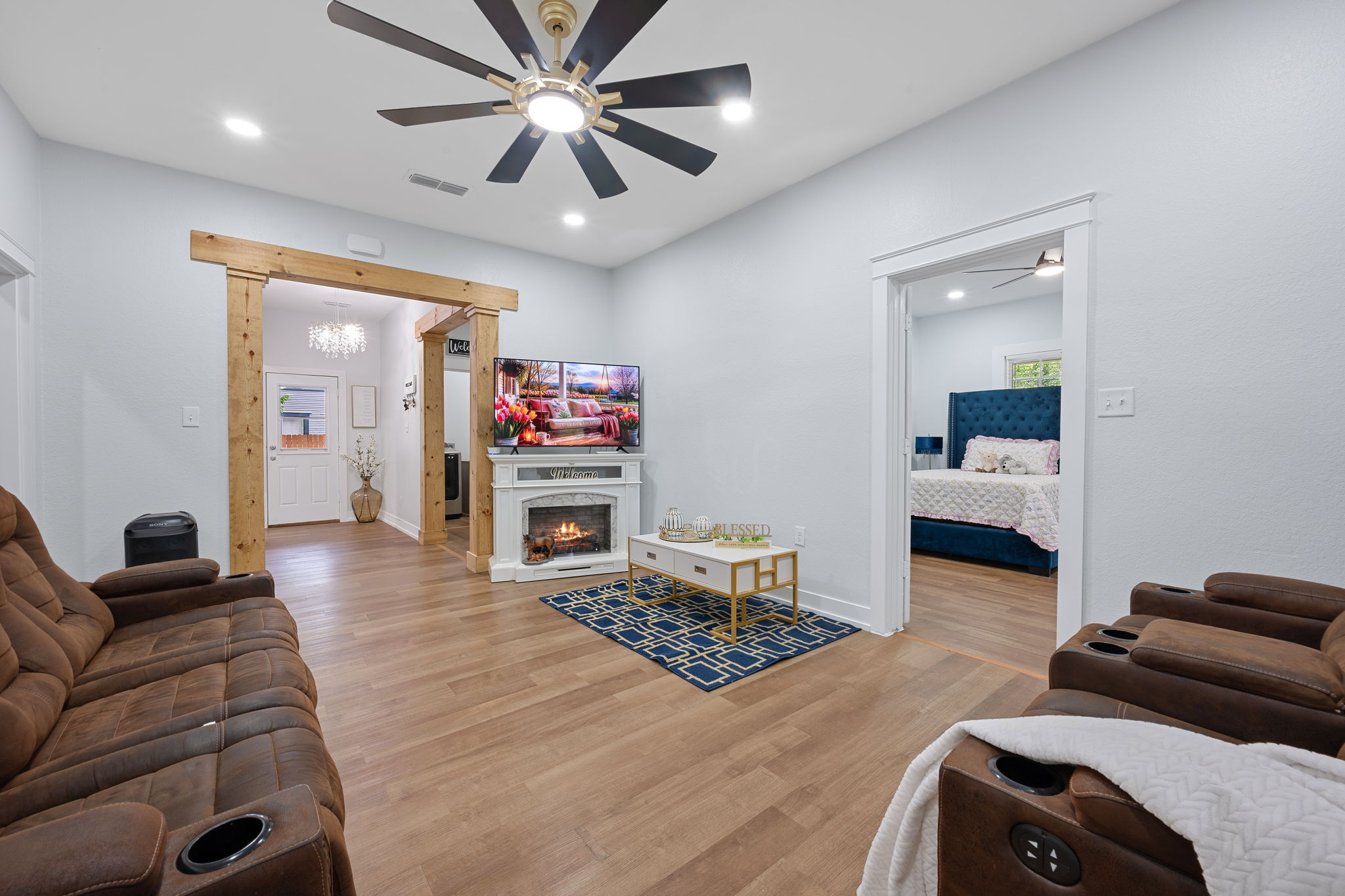 602 East 6th Street Cameron, TX 76520 - Photo 7 of 40 Living area featuring wood-finish flooring, recessed lighting, and a ceiling fan