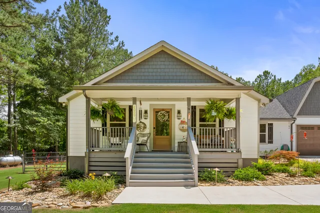 a front view of a house with a porch