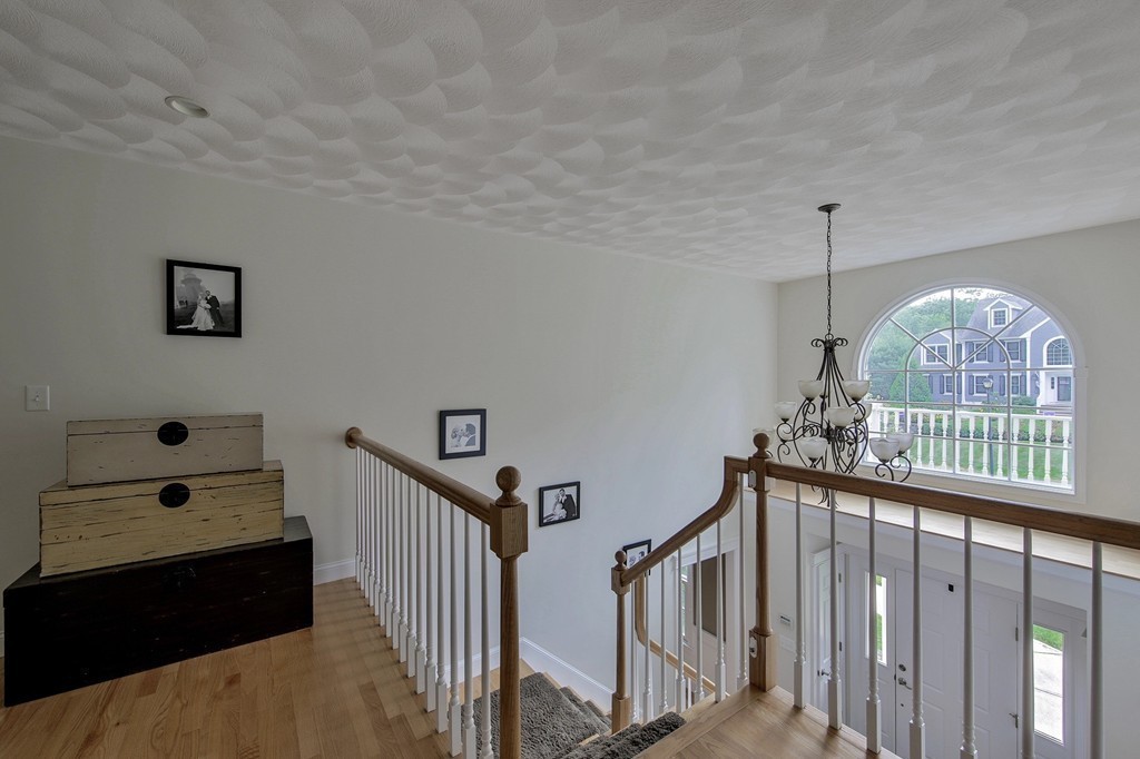 5 Wilkes Road Rowley, MA 01969 - Photo 13 of 25 a view of entryway with wooden floor