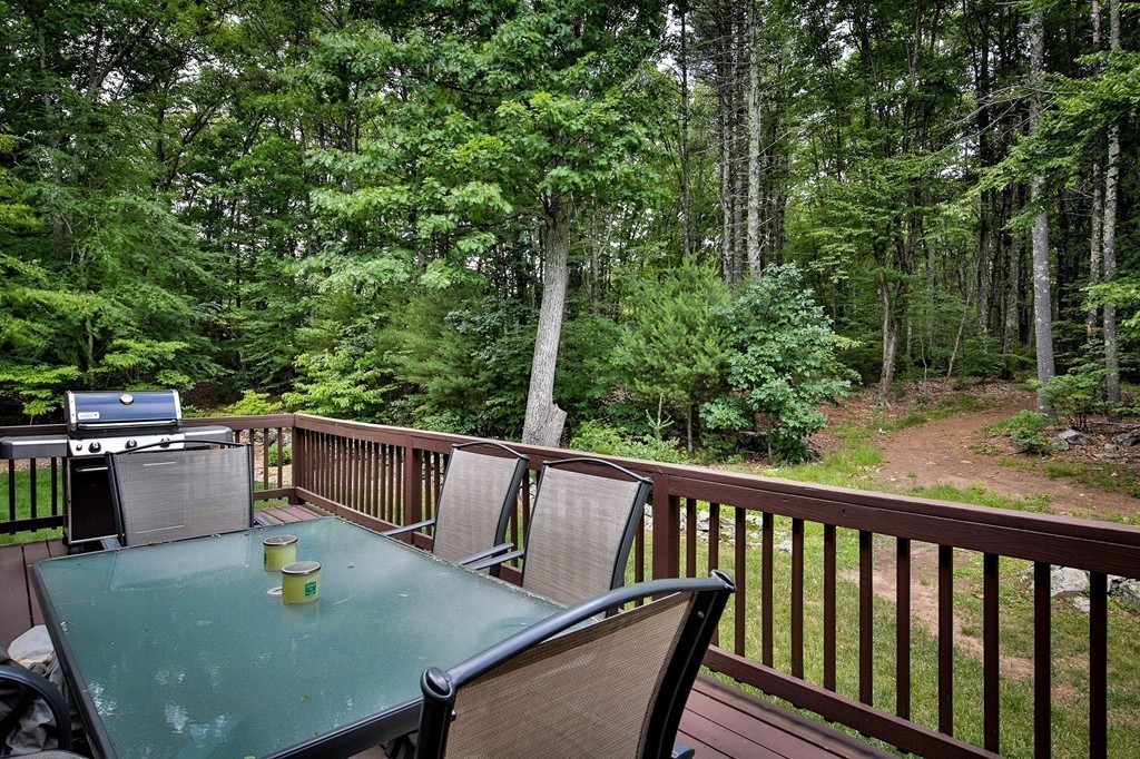 5 Wilkes Road Rowley, MA 01969 - Photo 21 of 25 a view of balcony with furniture and trees