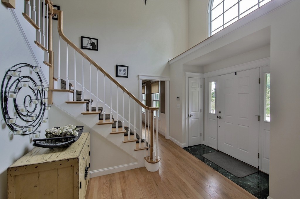 5 Wilkes Road Rowley, MA 01969 - Photo 5 of 25 a view of an entryway with wooden floor
