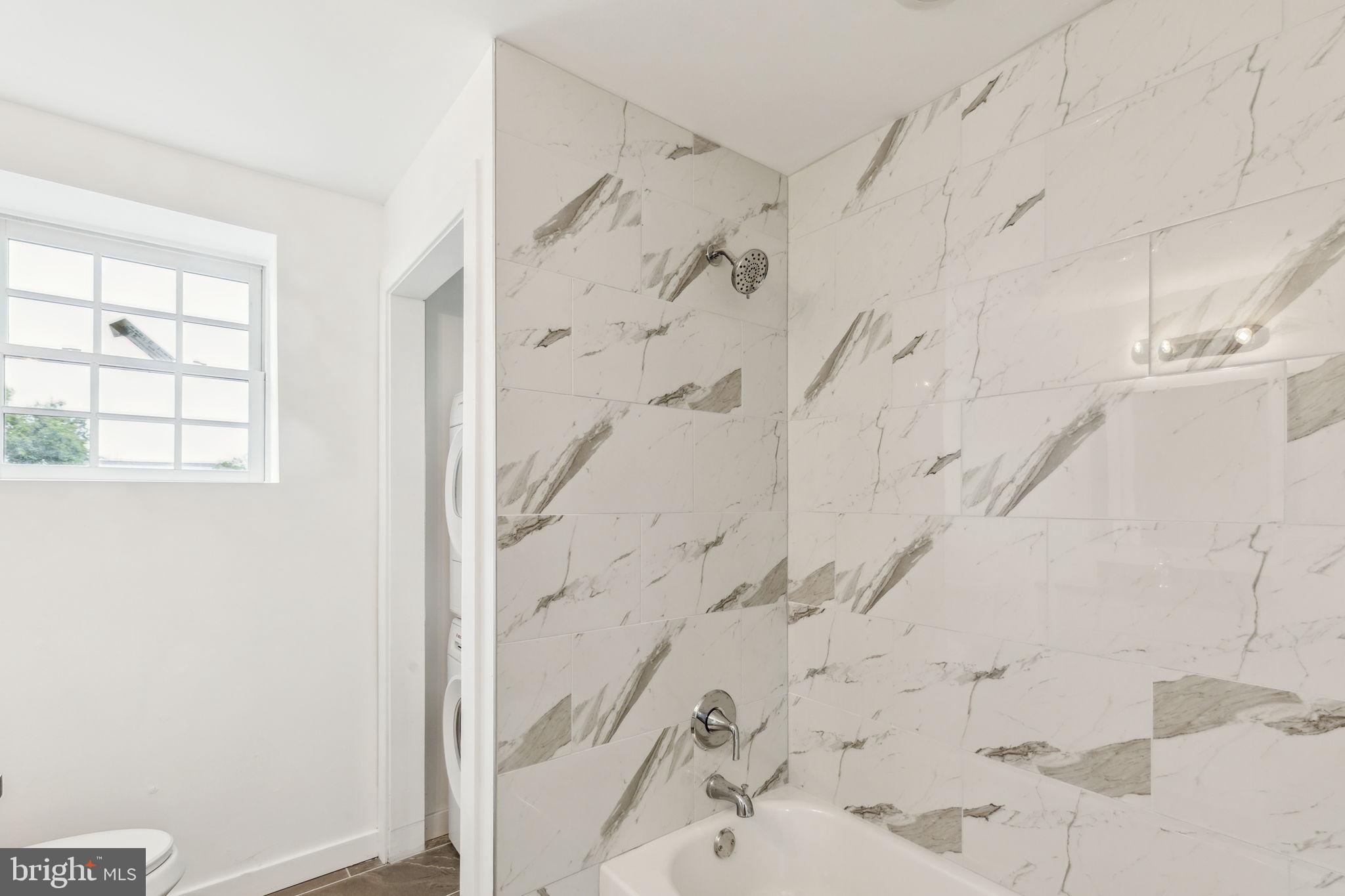 7039 Ridge Avenue Philadelphia, PA 19128 - Photo 12 of 26 a bathroom with shower