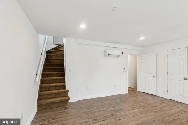 a view of entryway with wooden floor