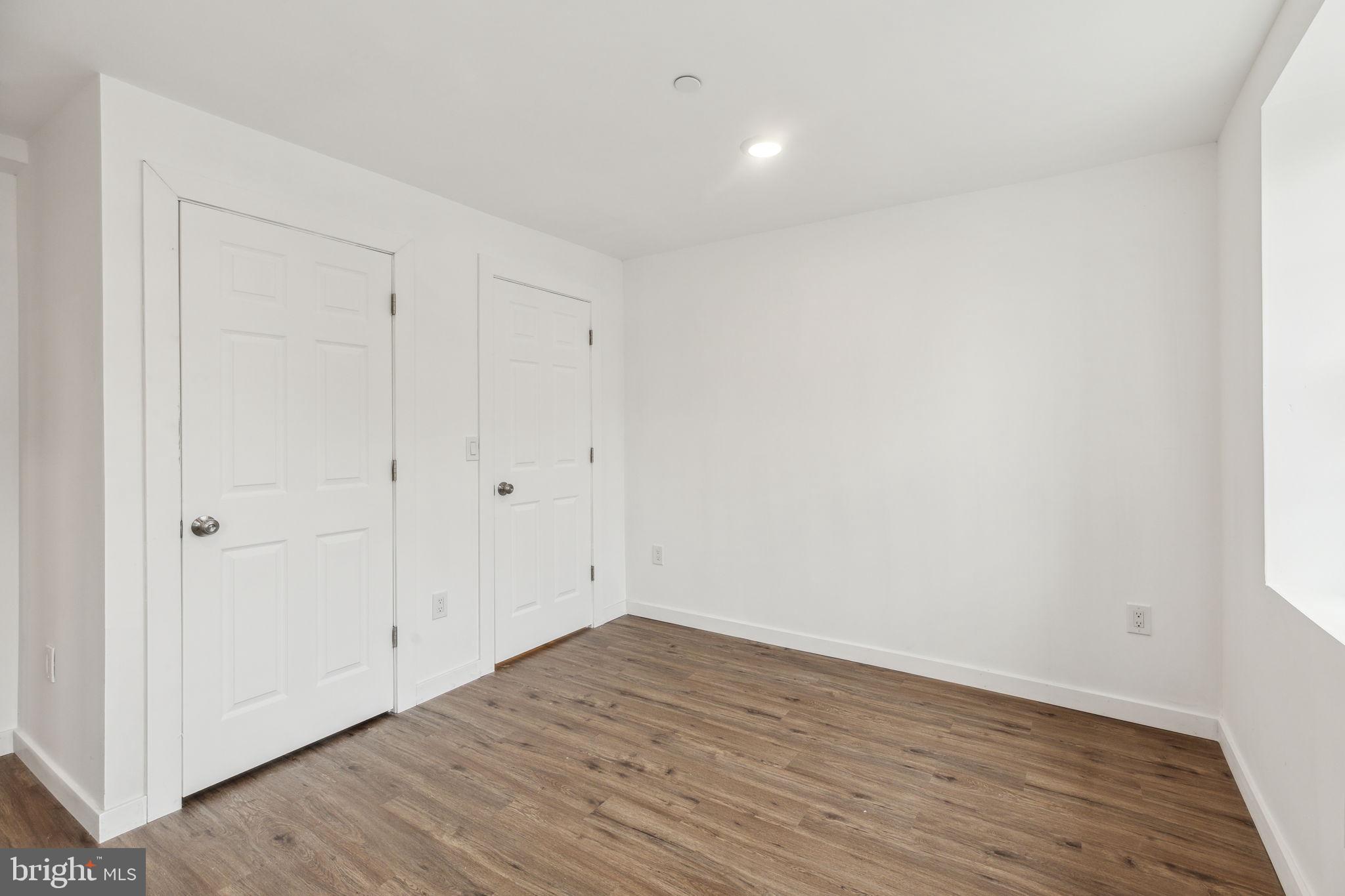 7039 Ridge Avenue Philadelphia, PA 19128 - Photo 26 of 26 a view of room with wooden floor