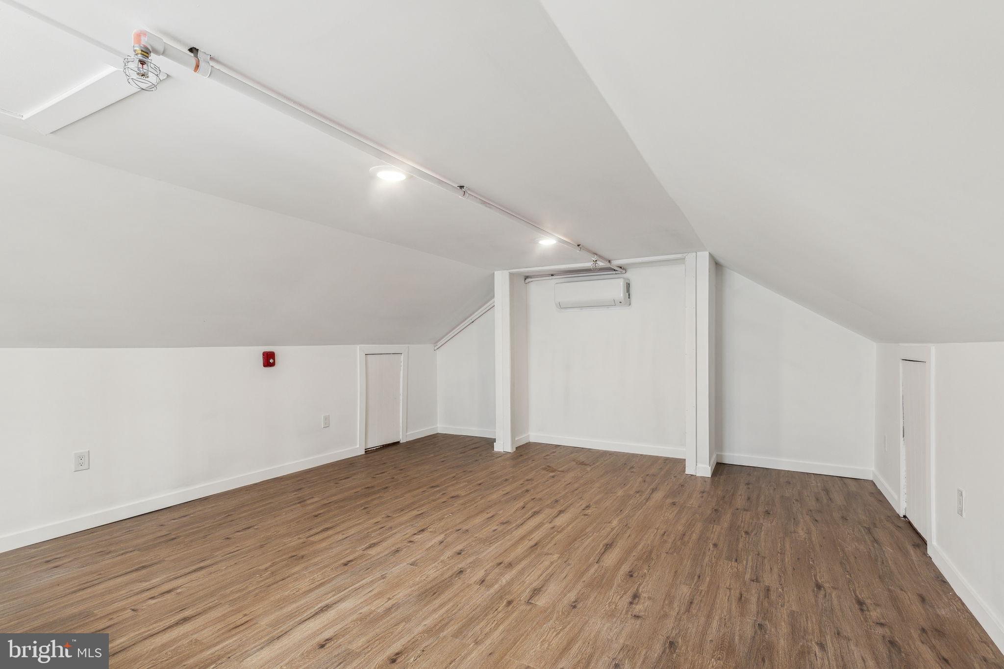 7039 Ridge Avenue Philadelphia, PA 19128 - Photo 8 of 26 wooden floor in an empty room