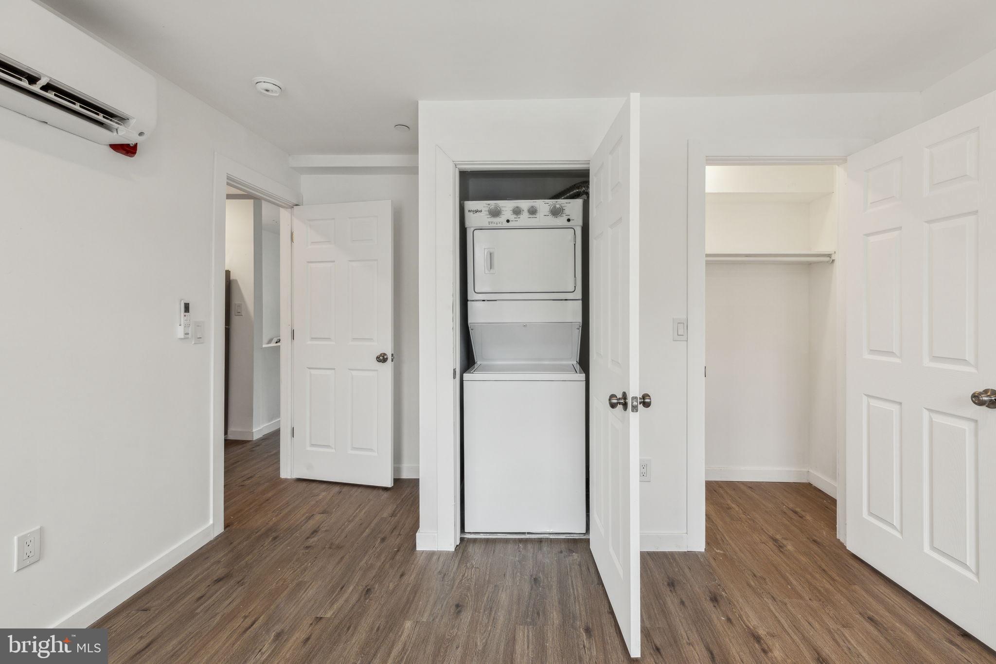 7039 Ridge Avenue Philadelphia, PA 19128 - Photo 9 of 26 a view of a hallway with wooden floor