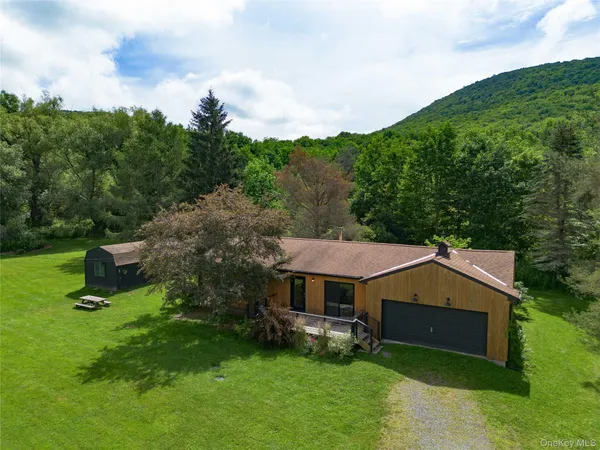a aerial view of a house with garden