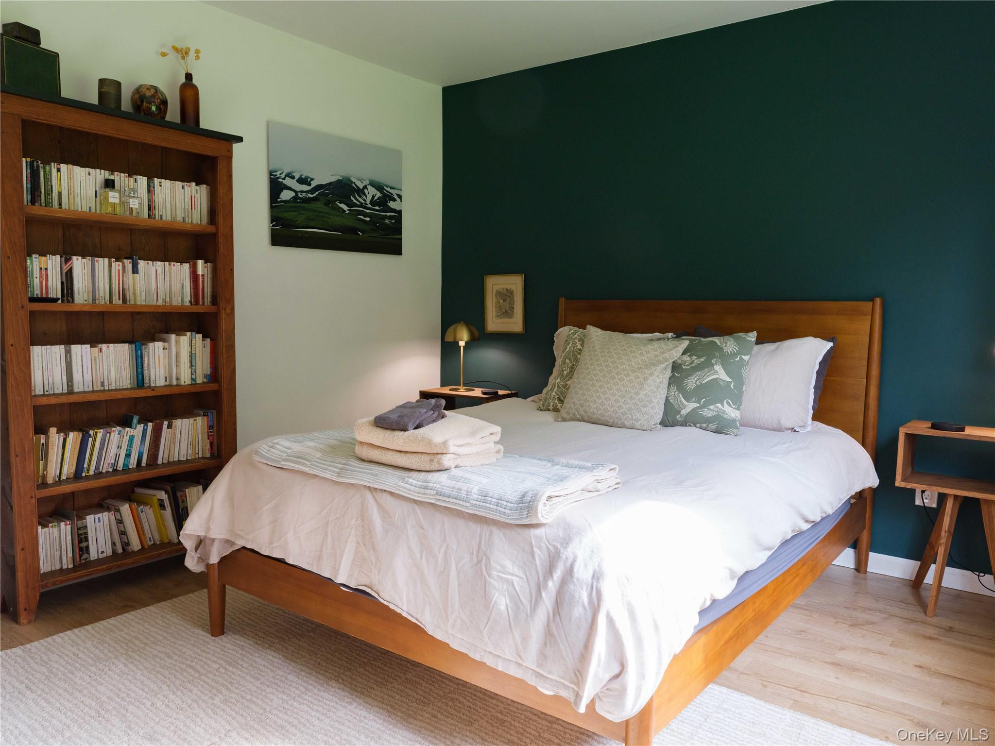 260 Gladstone Hollow Road Andes, NY 13731 - Photo 12 of 39 a bedroom with a bed furniture and a book shelf