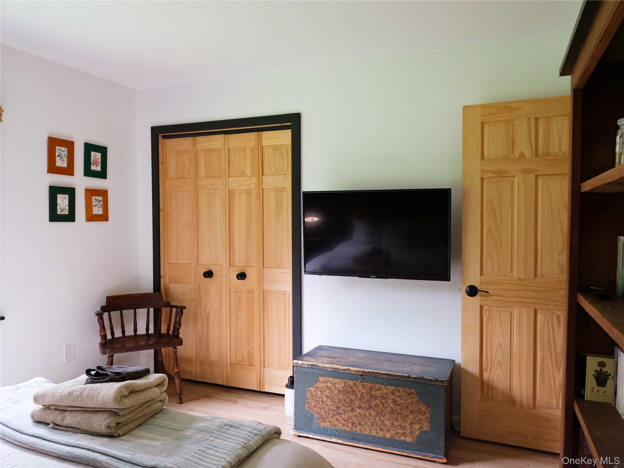 260 Gladstone Hollow Road Andes, NY 13731 - Photo 13 of 39 a living room with furniture and a flat screen tv