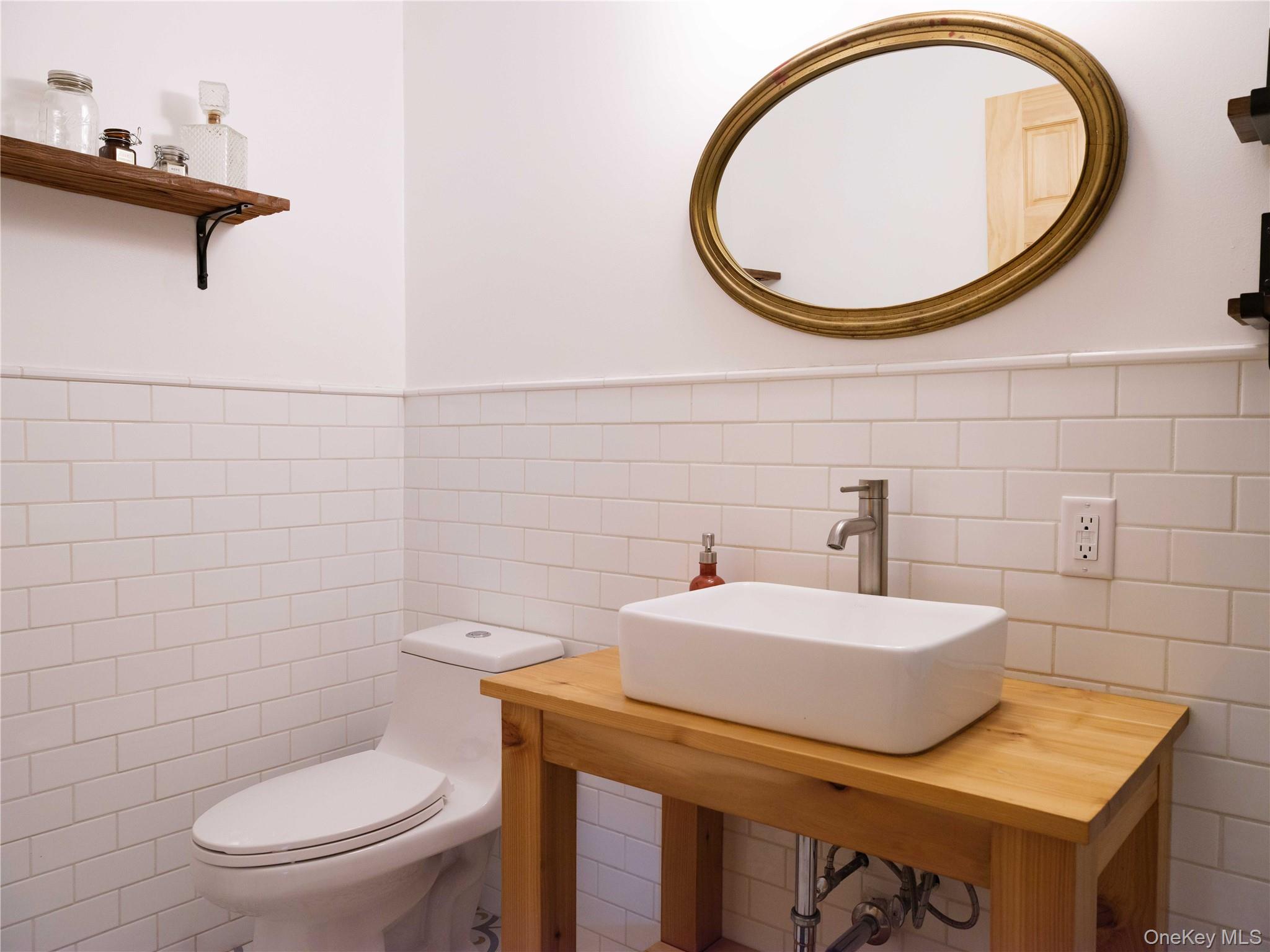 260 Gladstone Hollow Road Andes, NY 13731 - Photo 18 of 39 a bathroom with a toilet and a sink