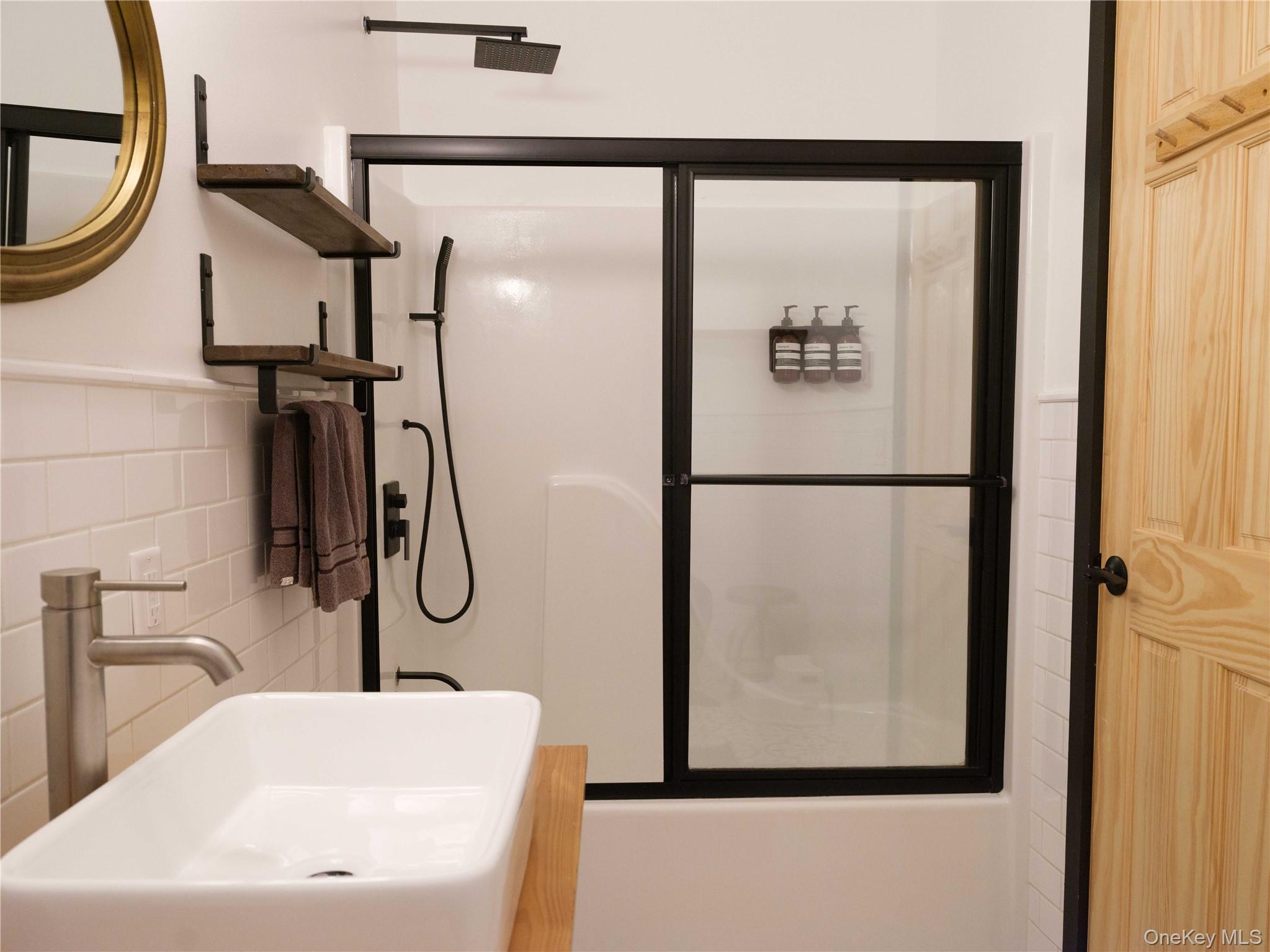 260 Gladstone Hollow Road Andes, NY 13731 - Photo 19 of 39 a bathroom with a sink and a mirror