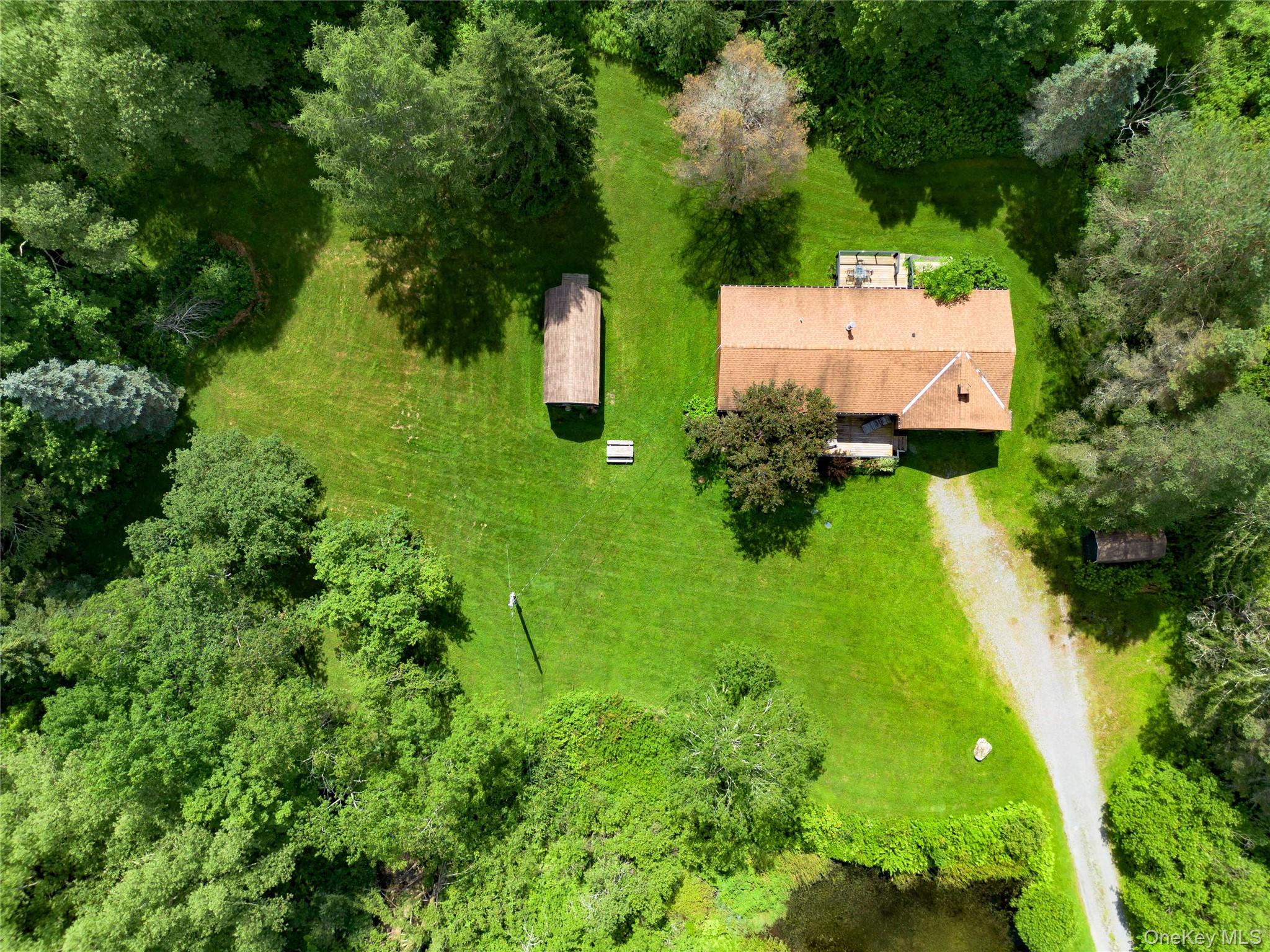 260 Gladstone Hollow Road Andes, NY 13731 - Photo 2 of 39 an aerial view of a house with a yard