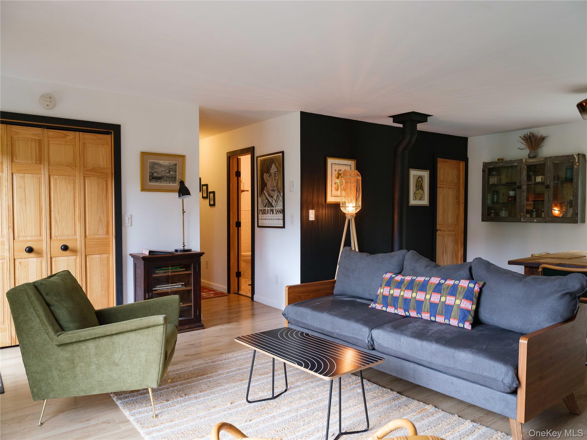 260 Gladstone Hollow Road Andes, NY 13731 - Photo 3 of 39 a living room with furniture and a table
