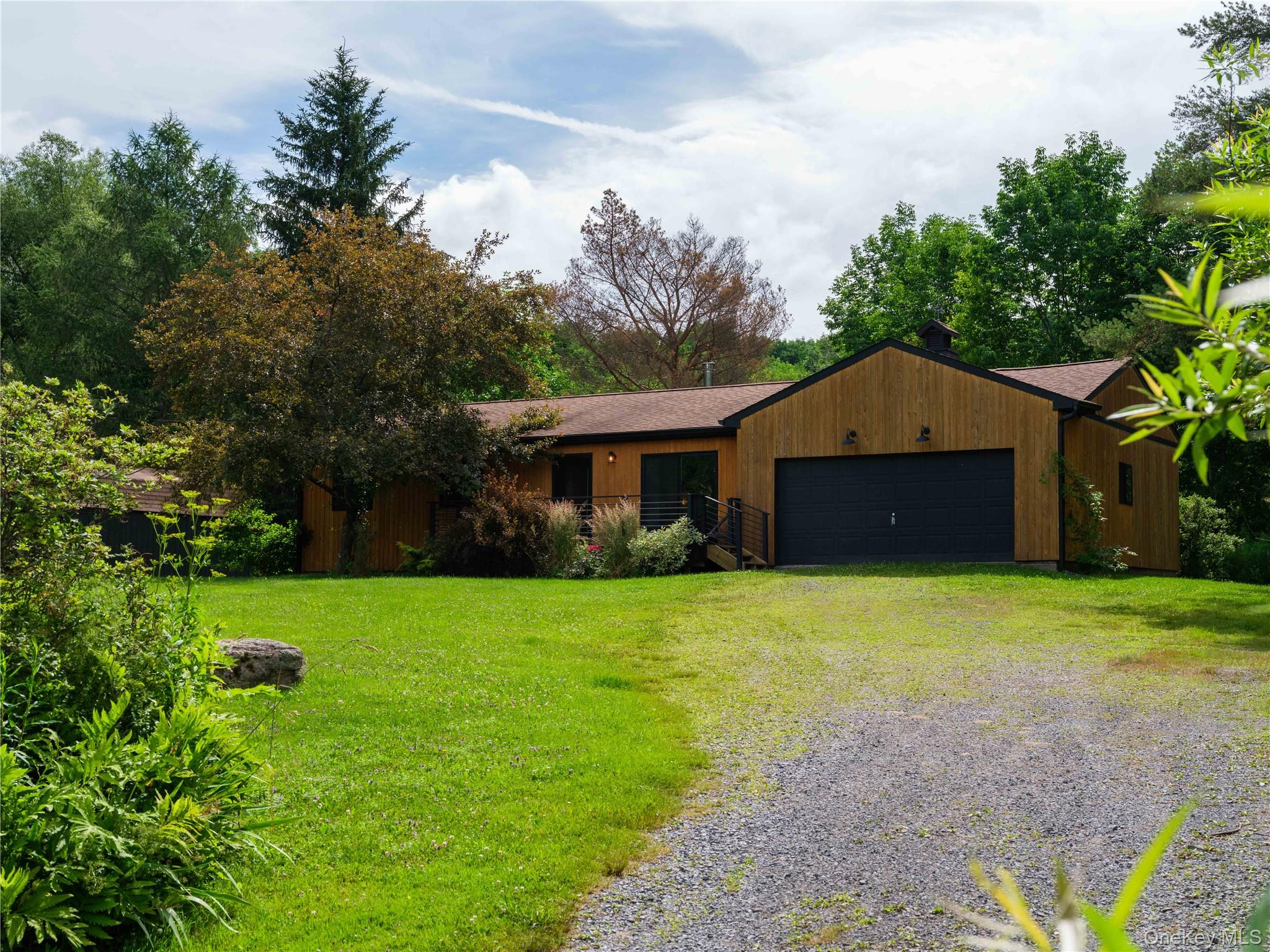 260 Gladstone Hollow Road Andes, NY 13731 - Photo 37 of 39 a front view of a house with garden