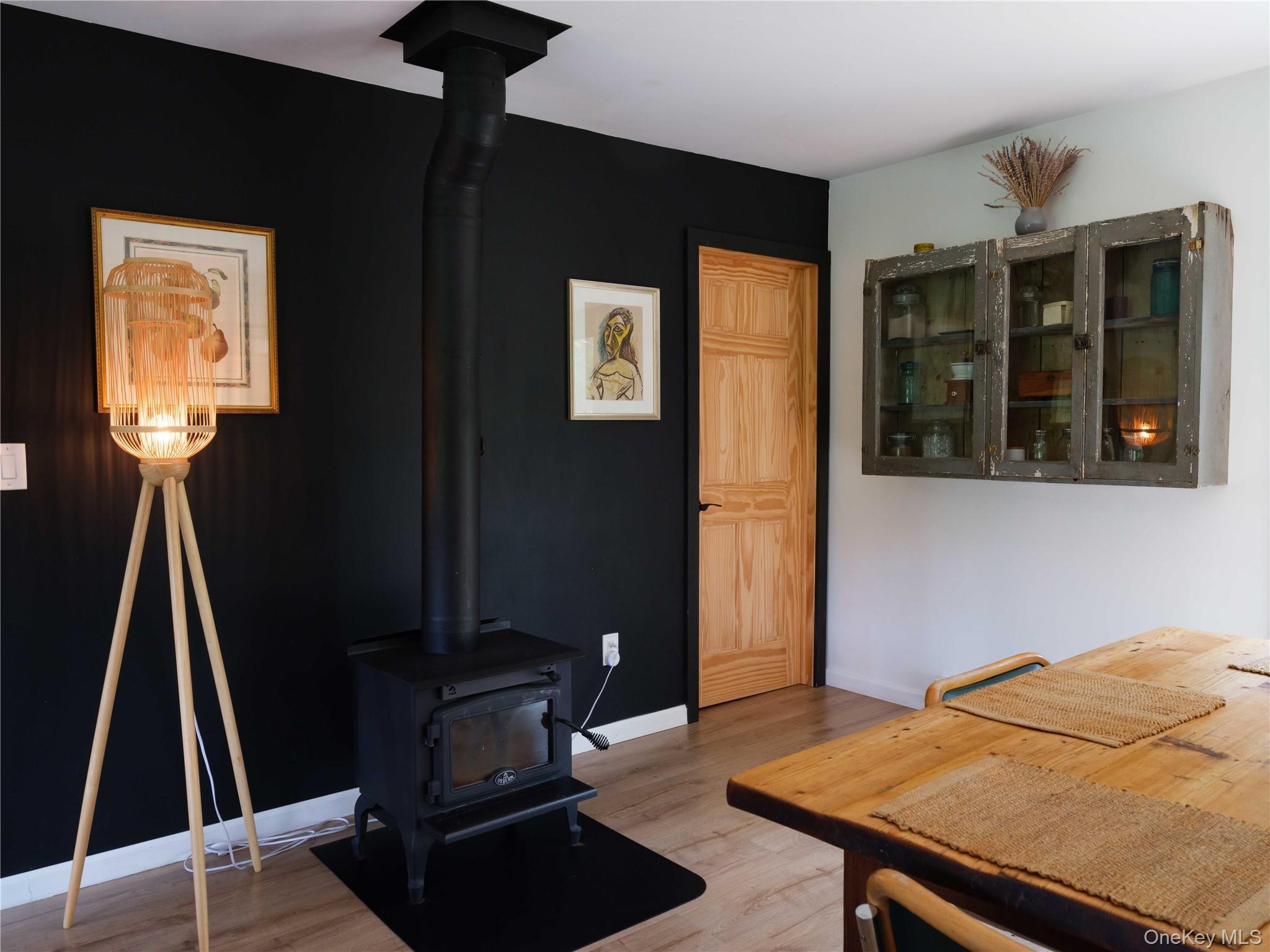 260 Gladstone Hollow Road Andes, NY 13731 - Photo 4 of 39 a bedroom with a bed and wooden floor