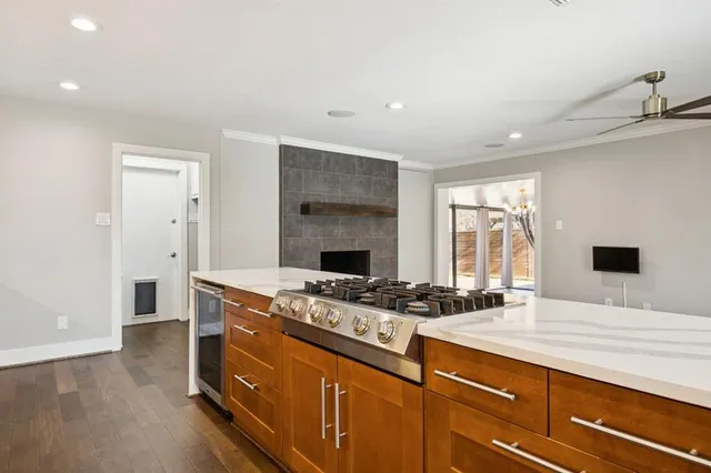 a kitchen with a stove and a sink