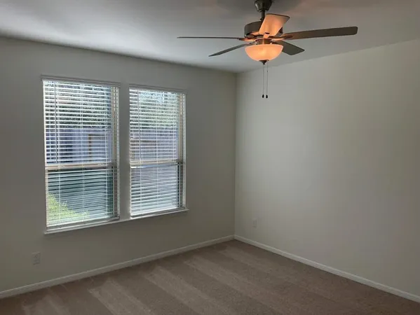 a bathroom with a sink toilet and mirror