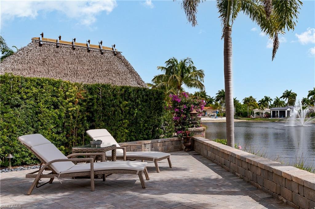 13410 Snook Circle Naples, FL 34114 - Photo 29 of 50 a view of a outdoor space with seating area