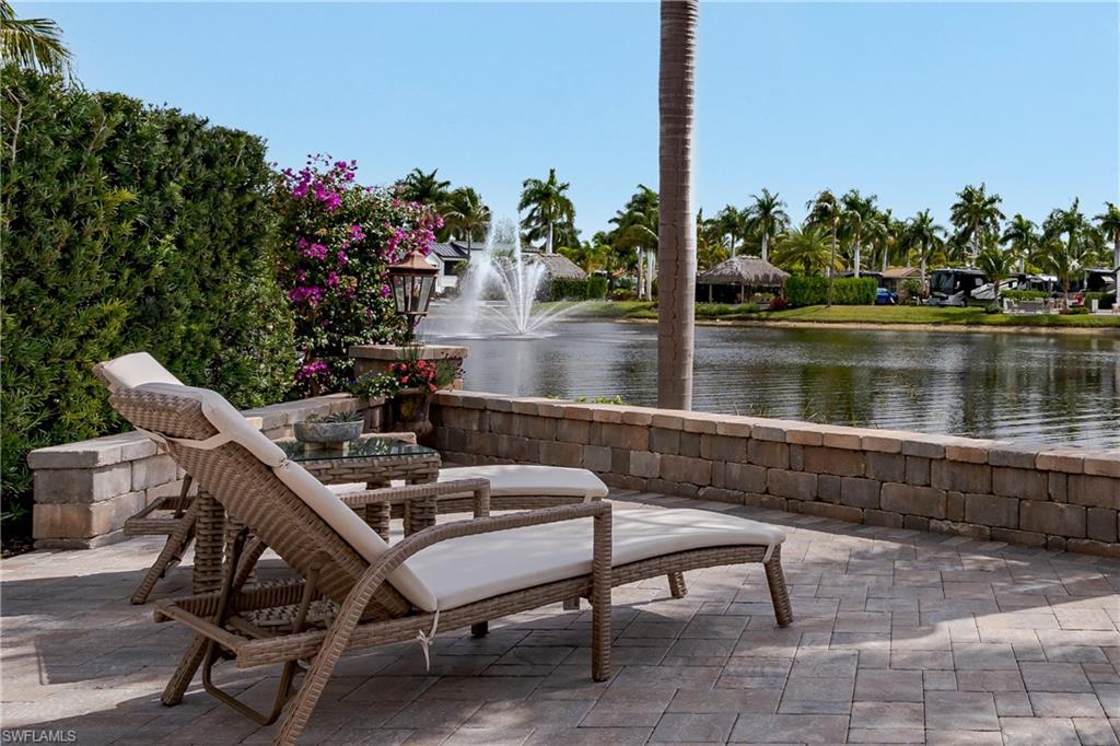13410 Snook Circle Naples, FL 34114 - Photo 30 of 50 a view of a terrace with sitting area