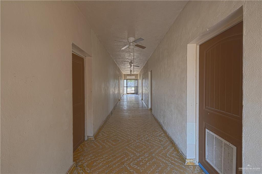 1106 Estrella Street Roma, TX 78584 - Photo 4 of 13 a view of a hallway with windows