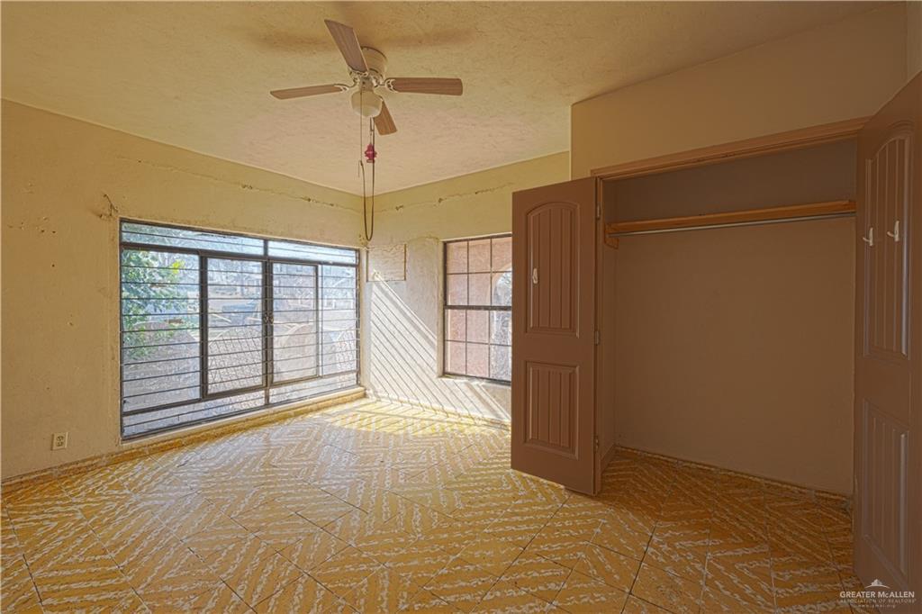 1106 Estrella Street Roma, TX 78584 - Photo 9 of 13 a view of an empty room with a window