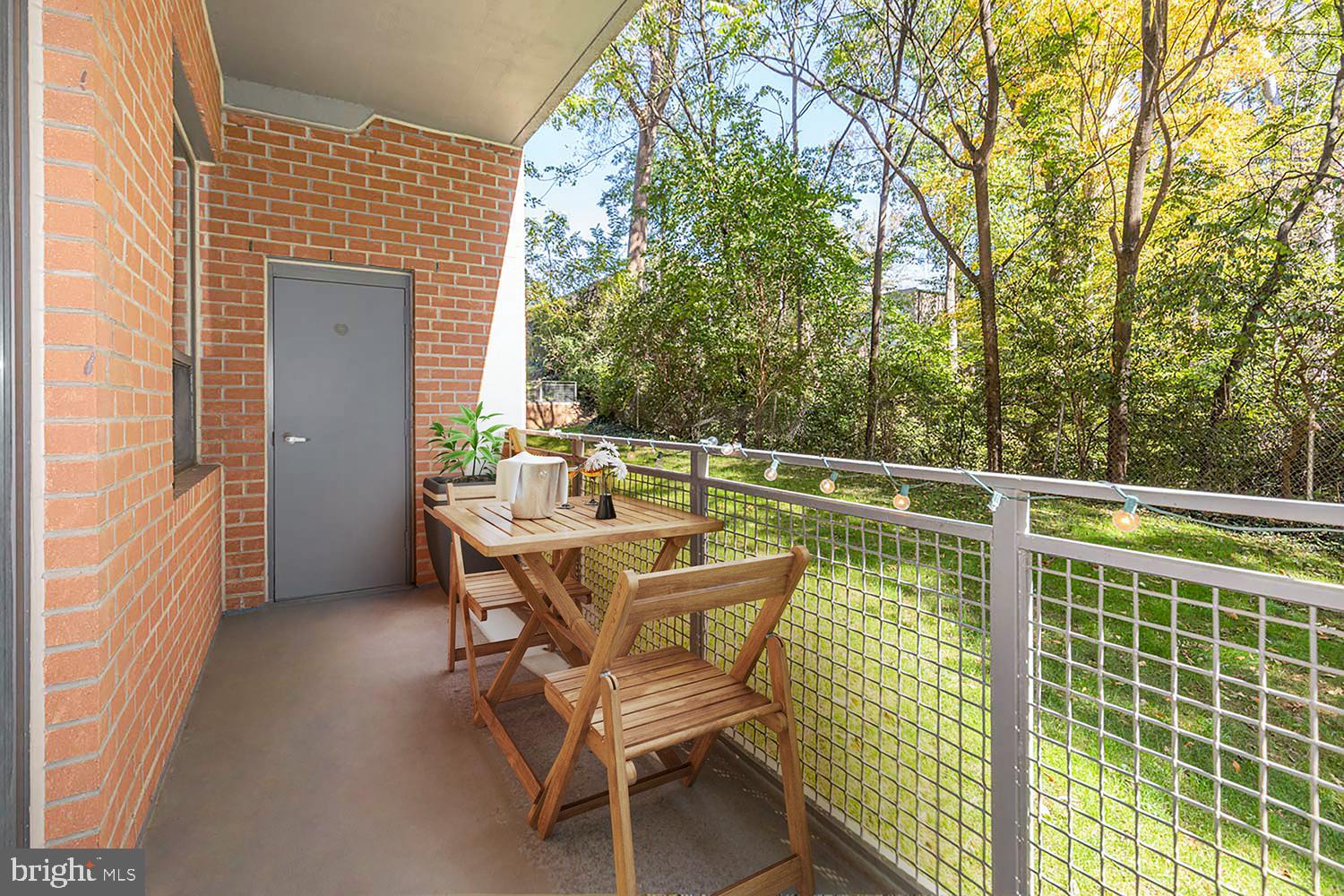 3883 Connecticut Avenue Northwest, Unit T3 Washington, DC 20008 - Photo 7 of 25 a balcony with table and chairs