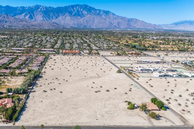 a view of city with ocean