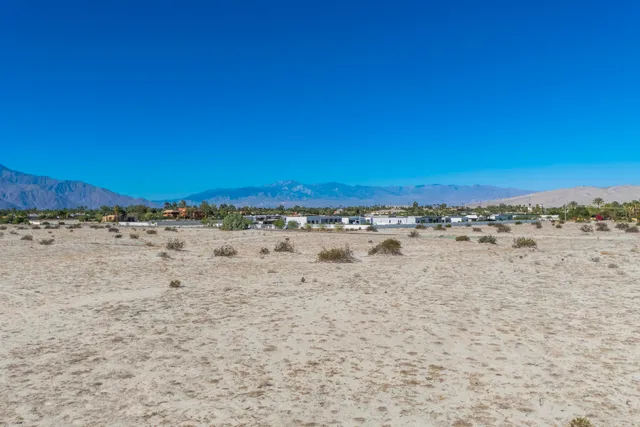 a view of beach and an ocean