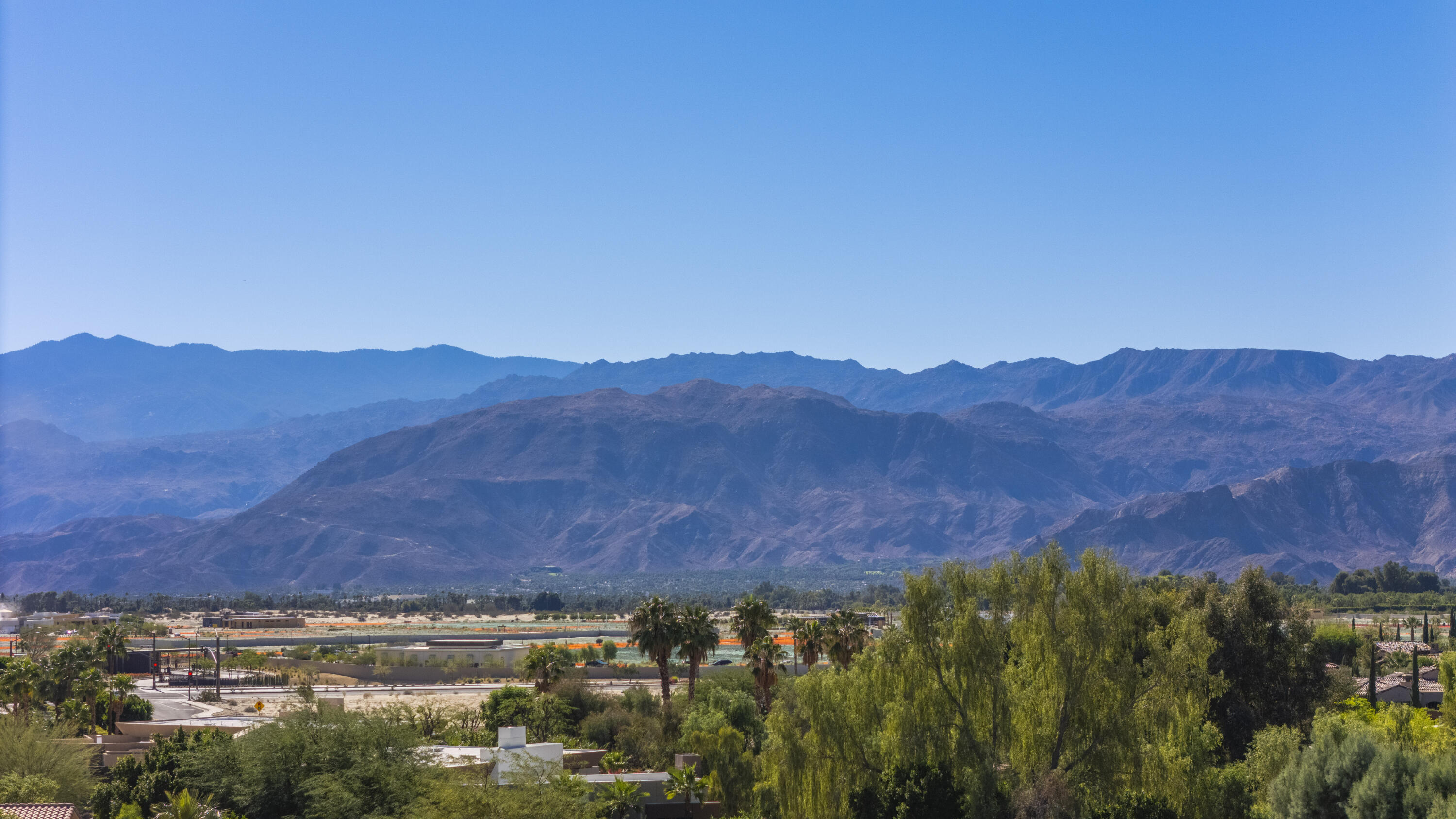 35335 Via Josefina Rancho Mirage, CA 92270 - Photo 4 of 24 a view of a city with mountains in the background