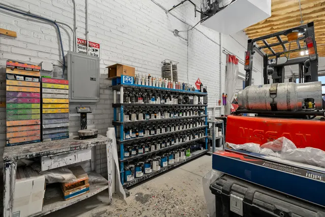 a storage room with furniture and a table