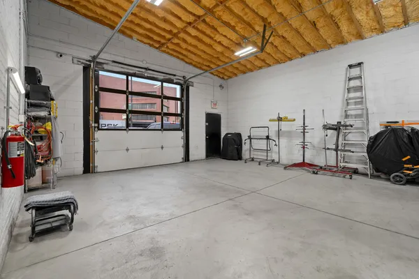a view of garage with furniture