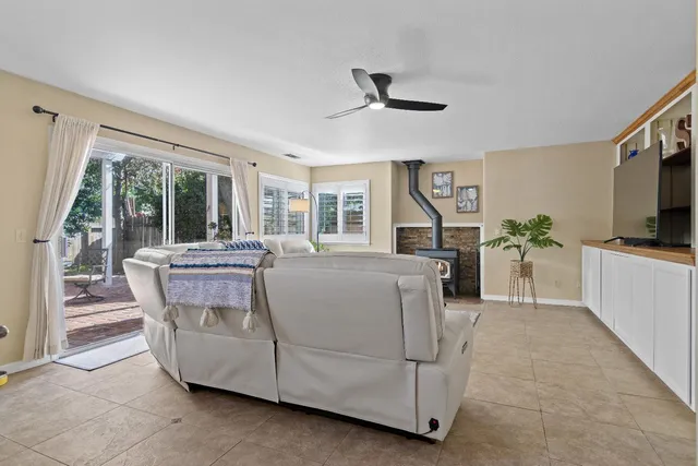 a living room with a couch and a flat screen tv