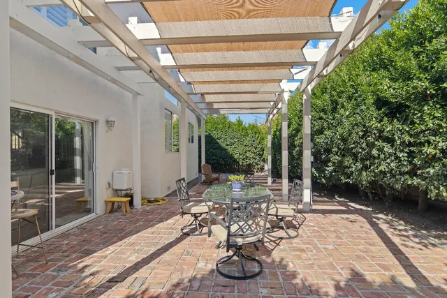 a view of a porch with furniture