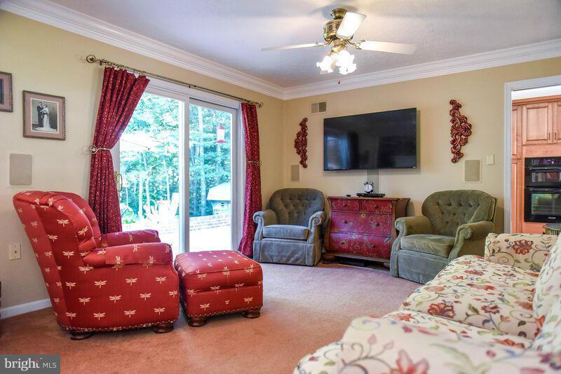 3511 Sixes Road Prince Frederick, MD 20678 - Photo 14 of 29 a bedroom with bed and a flat screen tv